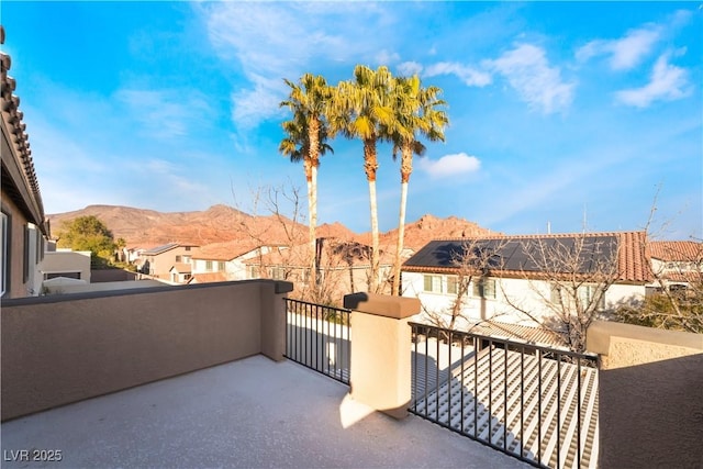 balcony featuring a mountain view