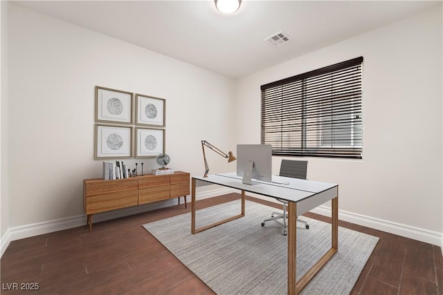 office with dark hardwood / wood-style floors