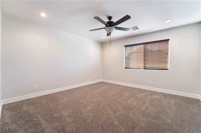 unfurnished room with ceiling fan and carpet flooring