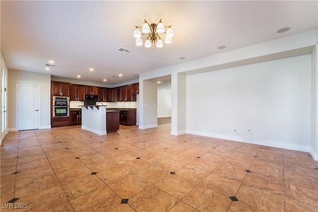 kitchen featuring a center island and double oven