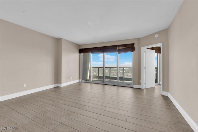 empty room featuring light wood-type flooring