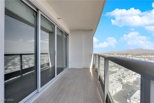 balcony featuring a mountain view