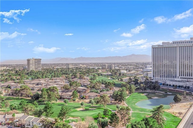 birds eye view of property with a water and mountain view