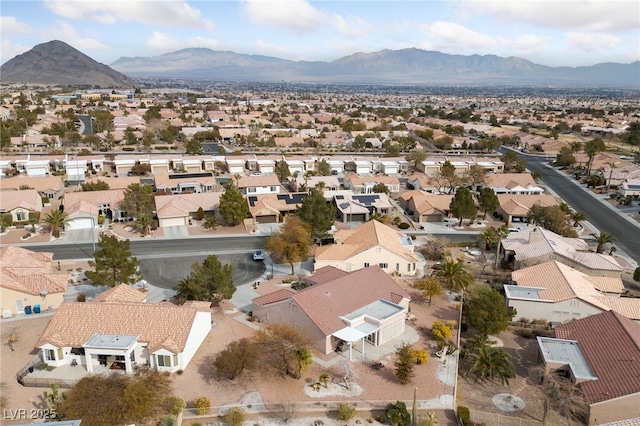 birds eye view of property featuring a mountain view