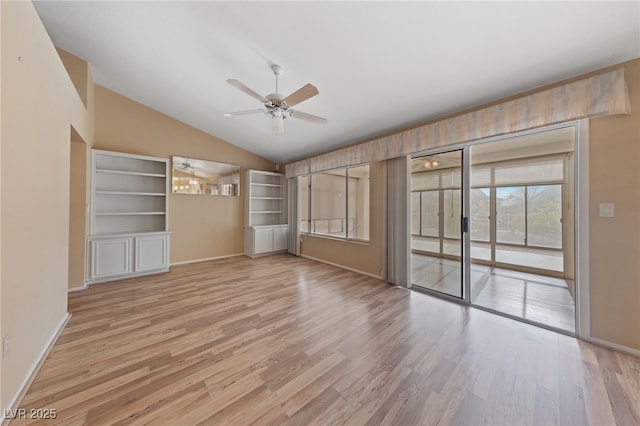 interior space featuring lofted ceiling, ceiling fan, and light hardwood / wood-style flooring