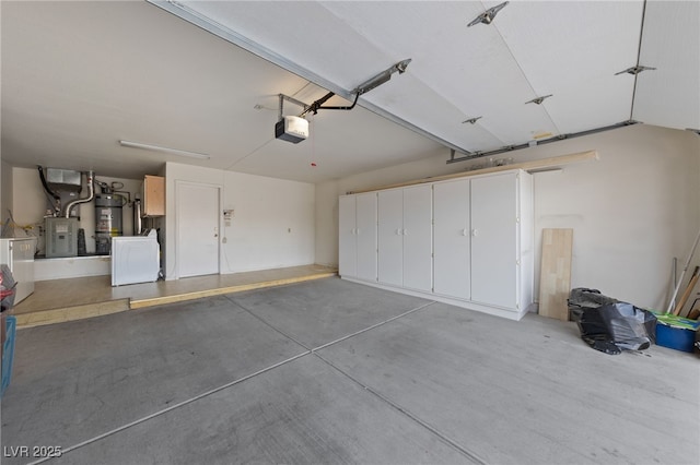 garage with a garage door opener, refrigerator, and secured water heater