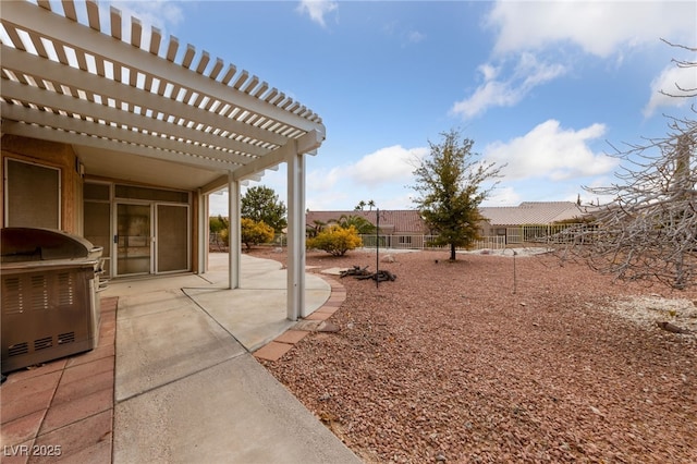 view of yard with a pergola and a patio area