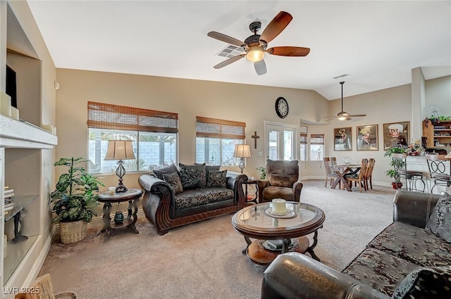 living room with carpet, high vaulted ceiling, and ceiling fan