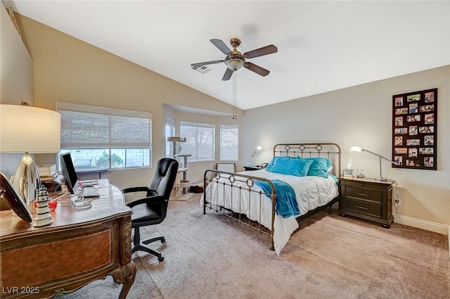 carpeted bedroom featuring vaulted ceiling and ceiling fan