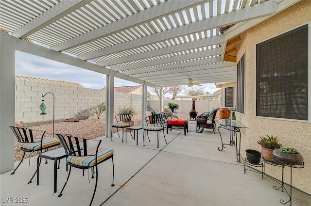 view of patio with outdoor lounge area and a pergola