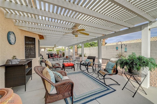 view of patio / terrace with an outdoor living space and a pergola