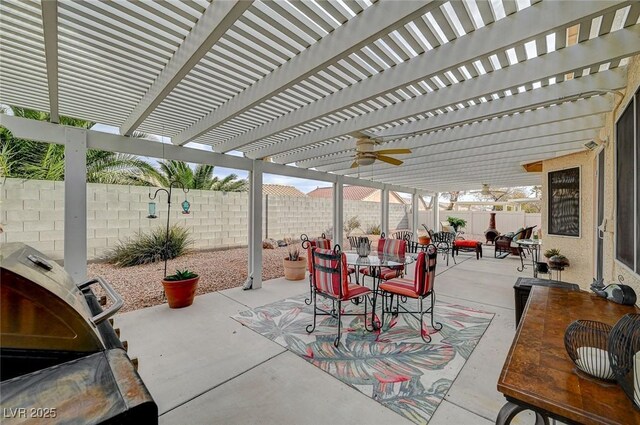 view of patio / terrace with grilling area and a pergola