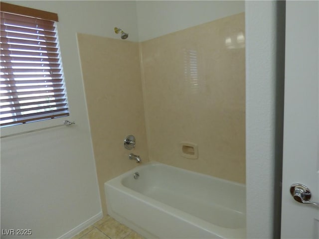 bathroom with shower / washtub combination and tile patterned flooring