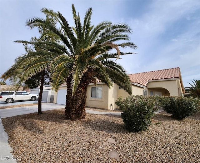 view of front of property with a garage