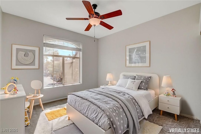 carpeted bedroom featuring ceiling fan