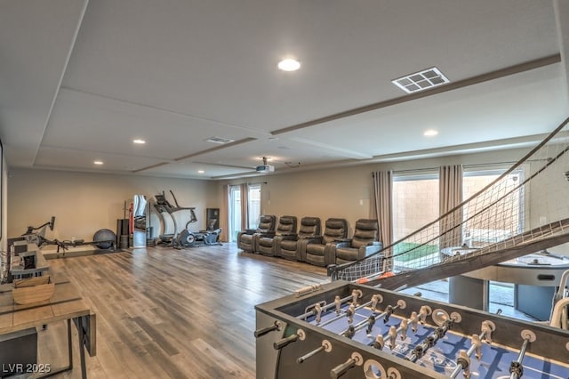 interior space featuring recessed lighting, visible vents, a healthy amount of sunlight, and wood finished floors