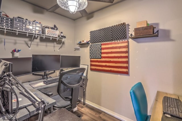 office area with ceiling fan, baseboards, and wood finished floors