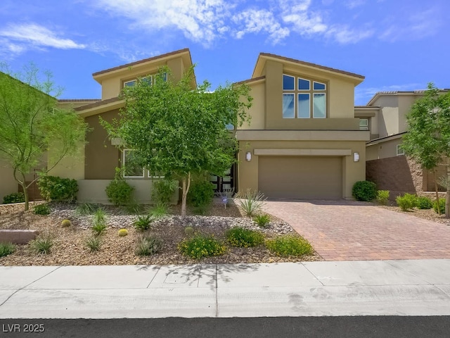 view of front of property with a garage