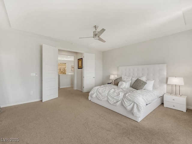 bedroom featuring light colored carpet and ceiling fan