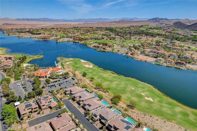 bird's eye view with a water and mountain view