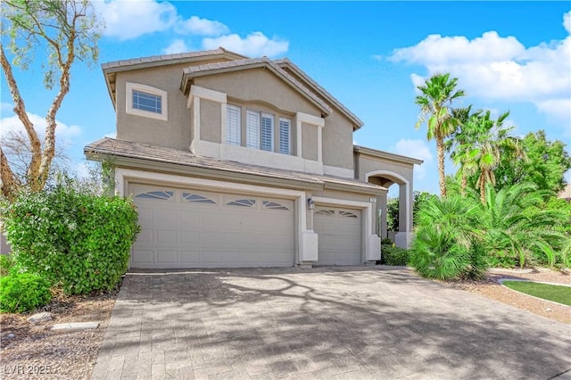 view of front of property featuring a garage