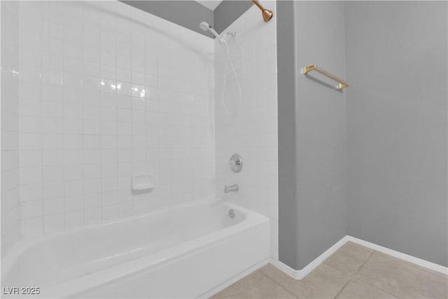 bathroom with tile patterned floors and tiled shower / bath combo