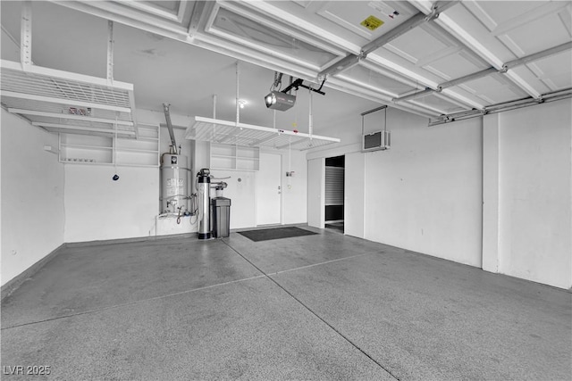 garage featuring a garage door opener and secured water heater