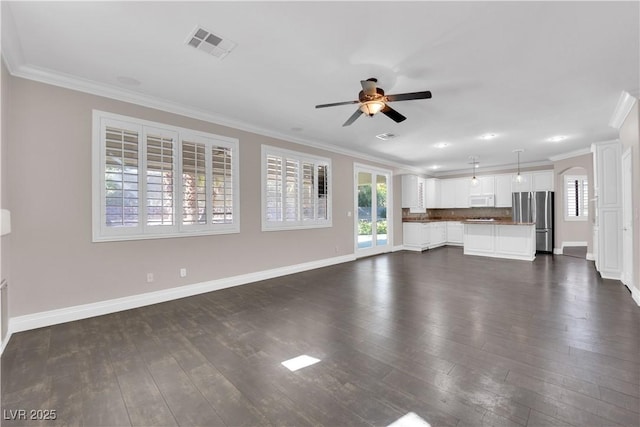 unfurnished living room featuring ornamental molding, dark hardwood / wood-style floors, and ceiling fan