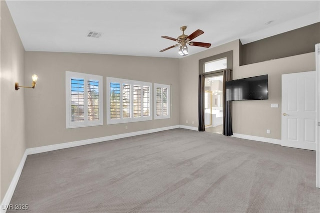 unfurnished living room featuring lofted ceiling, light colored carpet, and ceiling fan