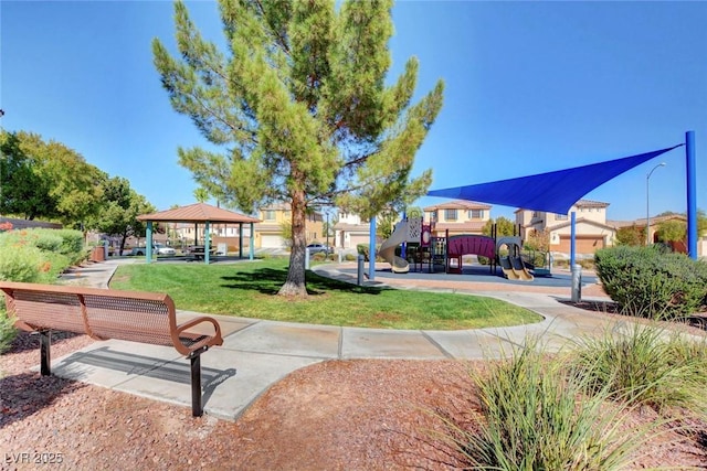 view of home's community featuring a gazebo, a playground, and a lawn