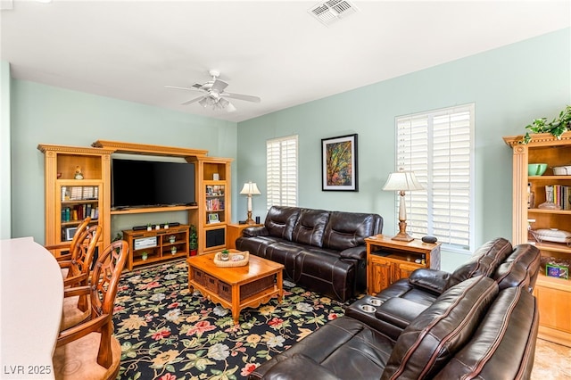 living room featuring ceiling fan