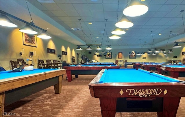 game room with carpet, pool table, and a drop ceiling