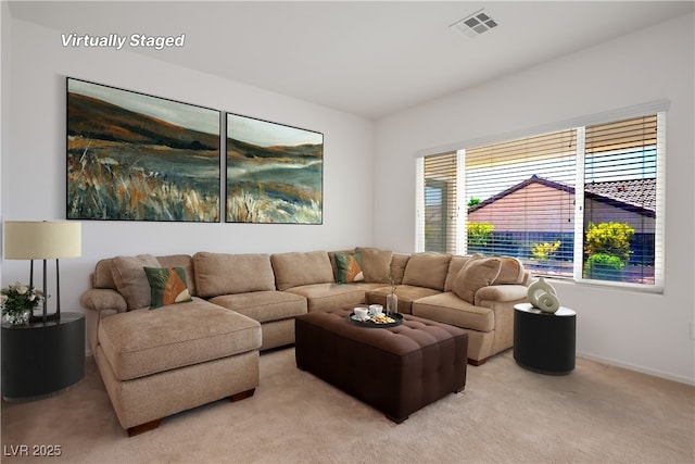 living room featuring light carpet