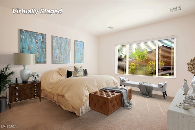 bedroom featuring light carpet