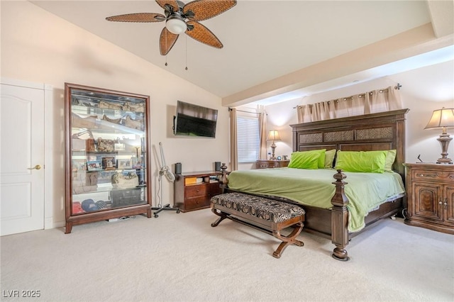 carpeted bedroom featuring ceiling fan and vaulted ceiling