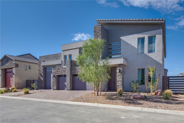 modern home featuring a garage