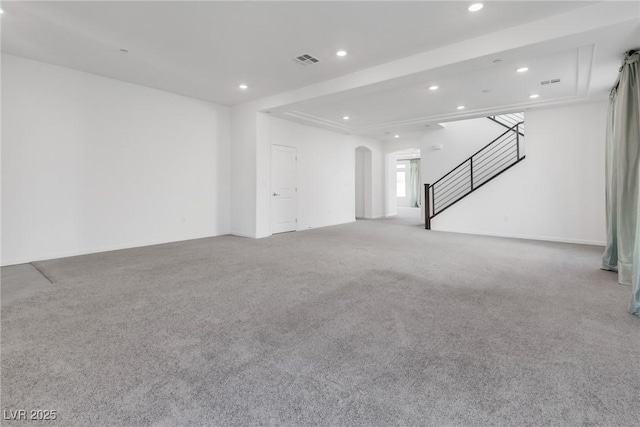 unfurnished living room with light carpet