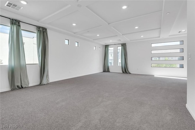 carpeted spare room featuring beamed ceiling and coffered ceiling