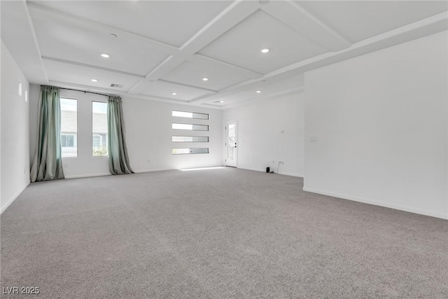 carpeted empty room featuring beamed ceiling and coffered ceiling