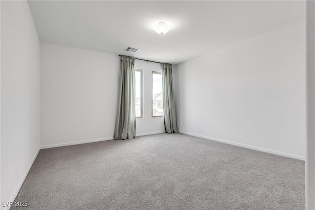 spare room with carpet floors