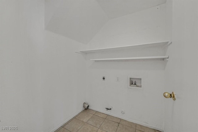 clothes washing area featuring washer hookup, hookup for a gas dryer, hookup for an electric dryer, and light tile patterned flooring