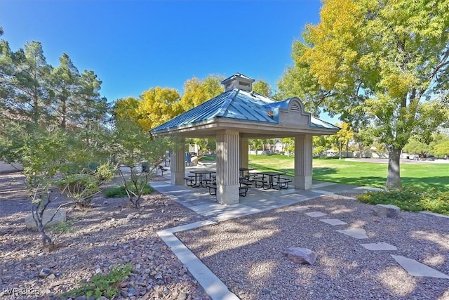 view of property's community featuring a gazebo and a lawn