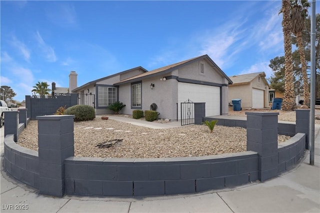 single story home with a garage