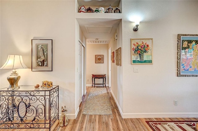 hallway featuring wood-type flooring