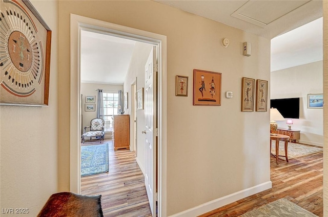 hallway featuring light wood-type flooring