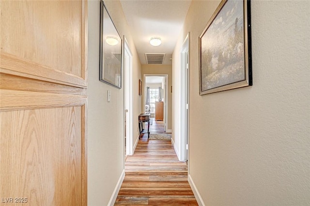 hall featuring light wood-type flooring