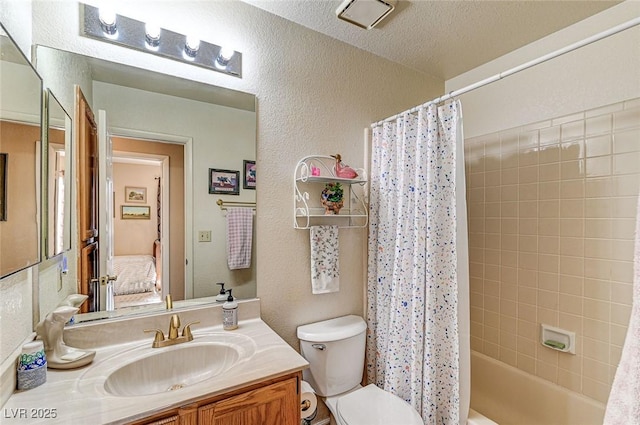 full bathroom featuring vanity, a textured ceiling, toilet, and shower / bath combo with shower curtain