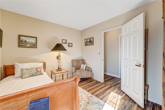 bedroom featuring hardwood / wood-style floors