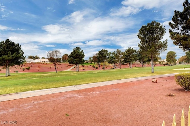 view of home's community featuring a yard