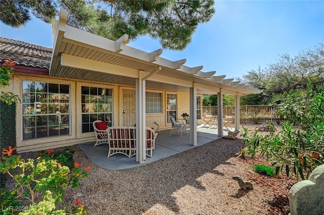 back of property featuring a patio